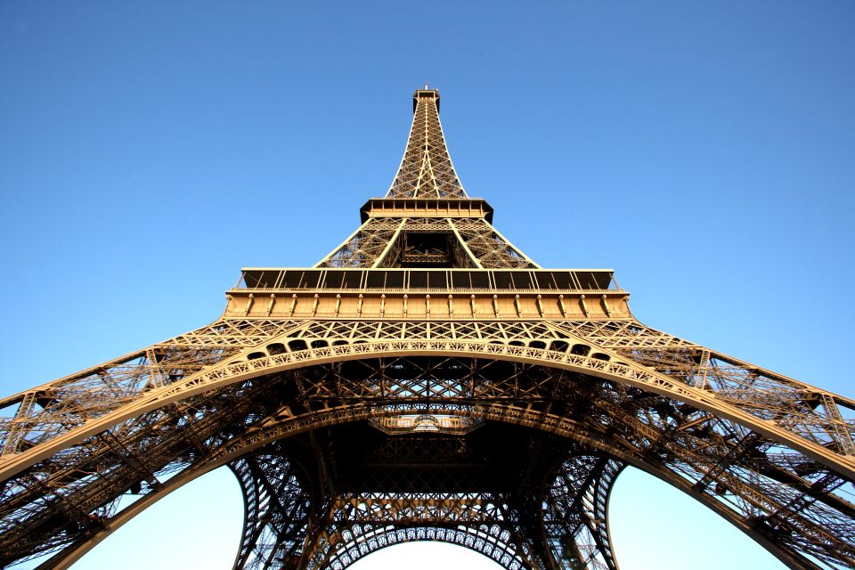 From London: Paris Day Trip with Eiffel Tower & Lunch Cruise - The guided whirlwind before lunch: useful context in limited time