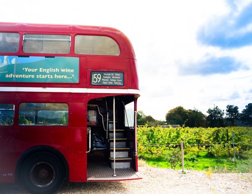 From London: Vintage Bus Wine Tour with Return Train Tickets - First Vineyard Stop: Guided Tour, Four-Wine Tasting, and Lunch Among the Vines