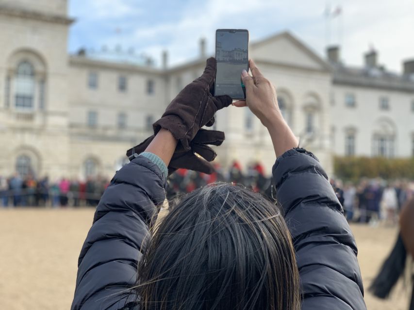 London: Changing of the Guard Private Group or Family Tour - The uniforms and music: red tunics, bearskins, and the soundtrack
