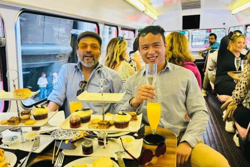 London: "Here We Go Again" Afternoon Tea Bus - A Pink Bus With Afternoon Tea and ABBA at Volume